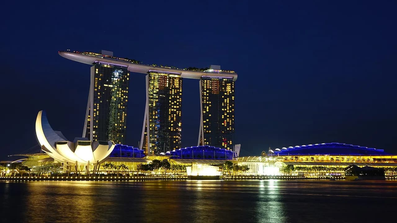 singapore, marina bay sands, landmark, artscience museum, singapore river, blue sky, hotel, tourism, travel, night, vibrant, reflection, lights, bright, blue travel, blue night, blue river, blue sand,